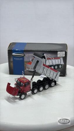STERLING 4 AXLE DUMP TRUCK WITH ROLL TARP
