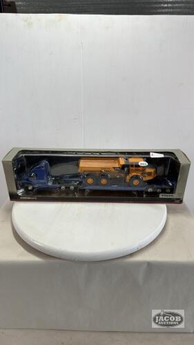 VOLVO TRUCK WITH DROP DECK TRAILER