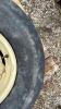 (1) USED 12.5X15 SL IMPLEMENT TIRE ON 6 BOLT HUB - 6