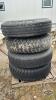 (4) 10-20 TIRES ON 8 BOLT RIMS - 2