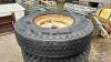 (4) 10-20 TIRES ON 8 BOLT RIMS - 3