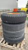 (4) 10-20 TIRES ON 8 BOLT RIMS - 2