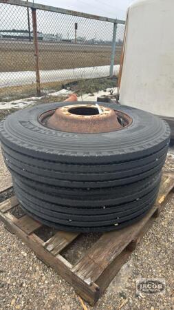 (2) USED 11R22.5 TIRES ON STEEL RIMS
