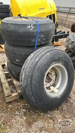 (4) TIRES ON 8 BOLT RIMS - DIFFERENT SIZED TIRES