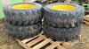 (4) SKID STEER TIRES ON RIMS 12-16.5NHS - 2