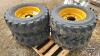(4) SKID STEER TIRES ON RIMS 12-16.5NHS - 4