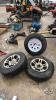 (3) 15IN TRAILER TIRES ON 5 BOLT RIMS