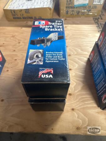 Two spare trailer tire brackets