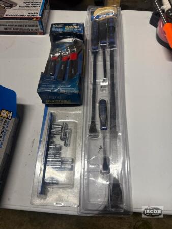 Pry bar , wrenches , sockets