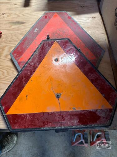2 slow moving signs