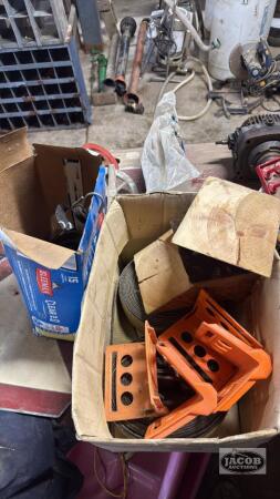 2 boxes of tie down straps , bungy straps misc