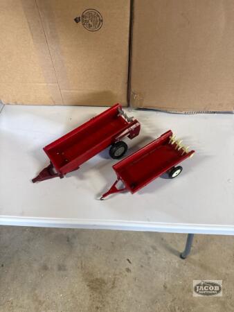 2 toy manure spreaders