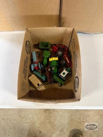 Box of miscellaneous farm toys