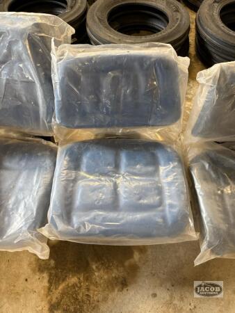 Unused blue suspension seat