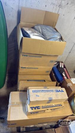9 boxes of unused car parts