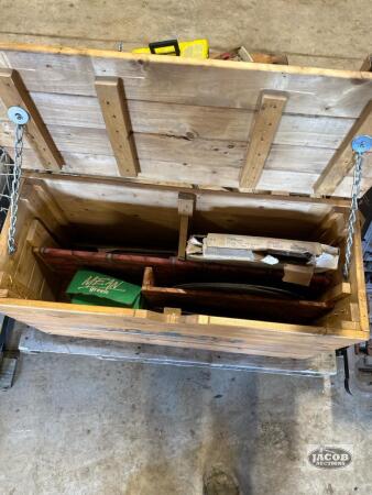 Wooden work box full of grinding wheels