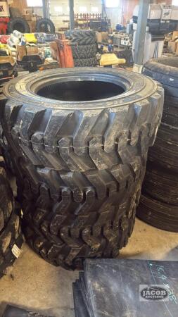 Unused 10-16.5 skid steer tire x4
