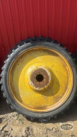Pair of 320/95/R48 tires on Jd 8 bolt wheels
