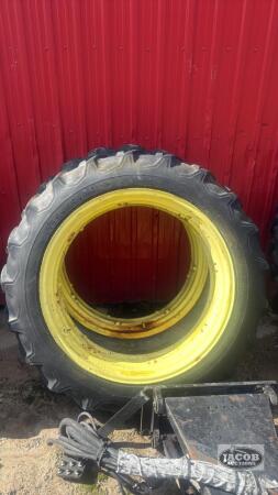 Pair of 12.4 -36 tires on John Deere rims