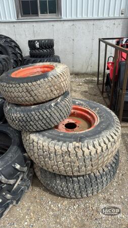 Set of 4 tires with rims off Kubota L4200