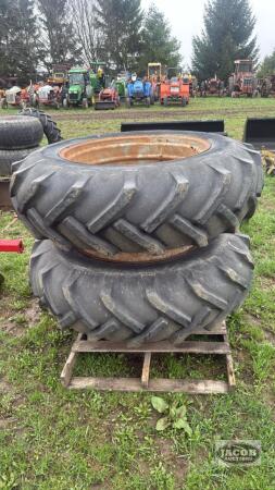 Pair of 16.9 34 tires with duals and hardware