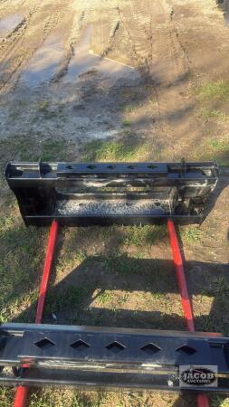 Unused skid steer quick tach 2 prong bale spear