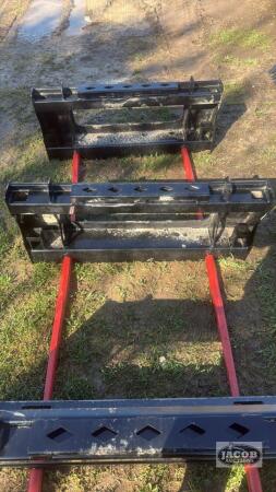 Unused skid steer quick tach 2 prong bale spear
