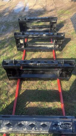 Unused skid steer quick tach 2 prong bale spear