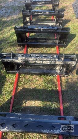 Unused skid steer quick tach 2 prong bale spear