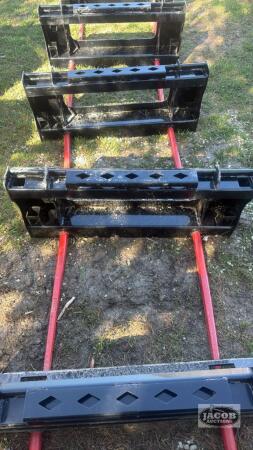 Unused skid steer quick tach 2 prong bale spear