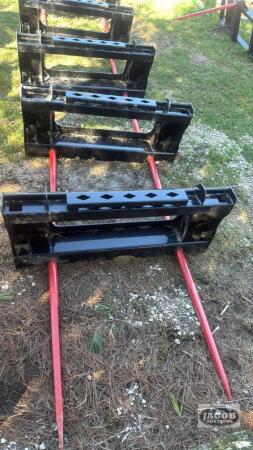 Unused skid steer quick tach 2 prong bale spear