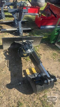 Unused skid steer quick tach backhoe attachment