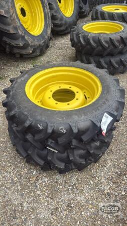 Unused Alliance 280/85R24 tire on Jd 8 bolt wheel x2