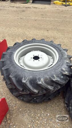 Unused Alliance 11.2 -24 tire of 6 bolt wheel x2