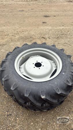Unused Alliance 11.2 -24 tire of 6 bolt wheel x2