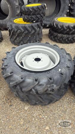 Unused Alliance 11.2 -24 tire of 6 bolt wheel x2