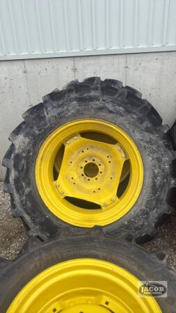 Unused 420/85R34 Firestone tire on Jd 8 bolt wheel x2