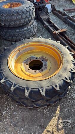 Pair of 9.5 R28 tires on John Deere 8 bolt wheels