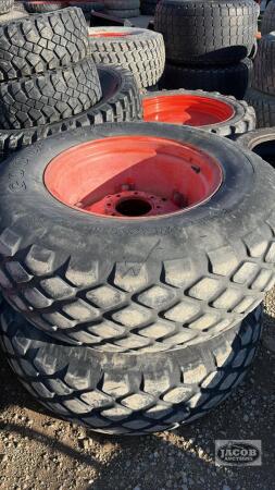 Pair of 16.9 - 24 tires on kubota 8 bolt wheels