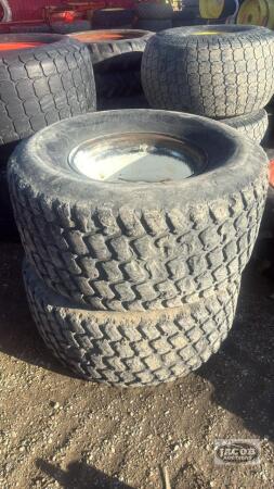 Pair of turf tires on Newholland 8 bolt wheels