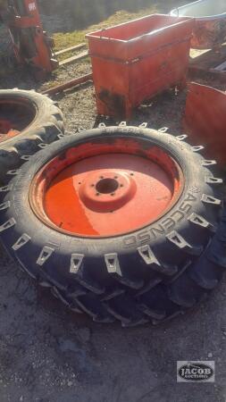 Pair of 9.5 - 32 tires on Kubota 6 bolt wheels