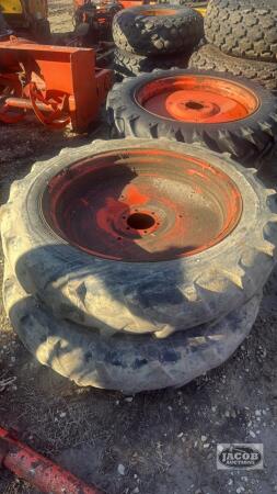 Pair of 9.5 - 32 tires on Kubota 6 bolt wheels