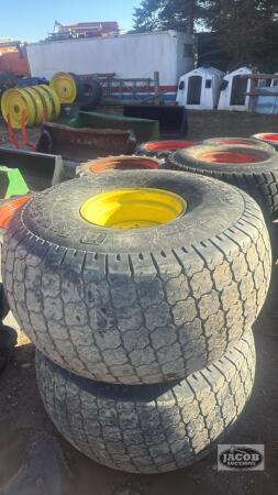 Pair of 22.5 x16.1 tires on 8 bolt Jd wheels