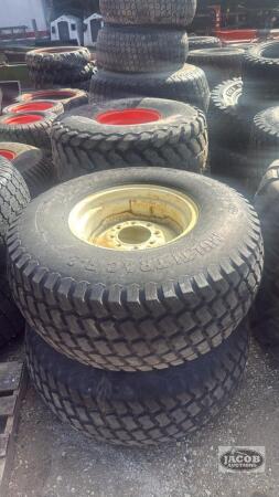 Pair of 44x18.00-20 tires on John Deere 8 bolt wheels