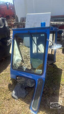 Sims compact tractor cab