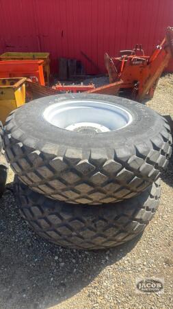 Pair of 16.9-24 tires on Newholland 8 bolt wheels