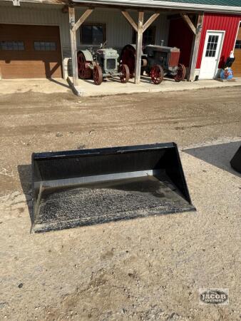 Unused 60in skid steer quick tach bucket