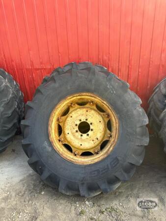 Pair of 18.4 39 tires on John Deere 8 bolt wheels