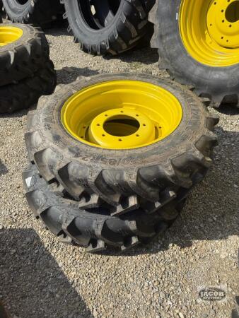 Unused Alliance 280/85R24 tire on Jd 8 bolt wheel x2