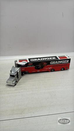 JOHN DEERE SEMI PULLING GRAINGER CAR HAULER